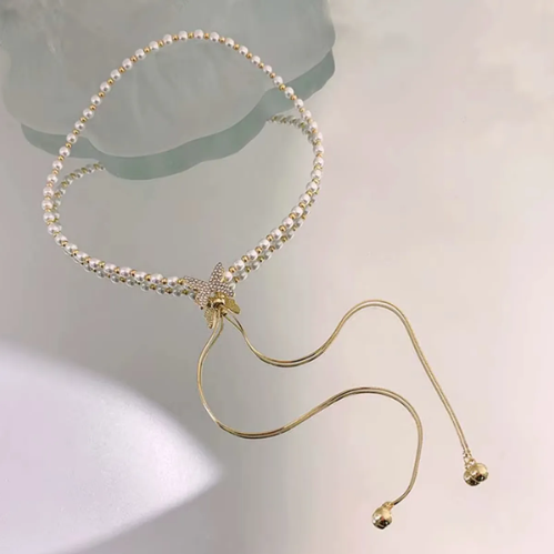 COLLAR DE PERLAS CON MARIPOSA